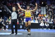 Ferrari wrestling for California State during the 2025 NCAA Wrestling Championships (Image via: Getty Images)